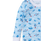 The Kissy Kissy Galaxy Printed PJ Set is a light blue pajama set for children with a space theme, showcasing red and blue rockets, planets, and stars. Made from soft Pima cotton, it features white cuffs.