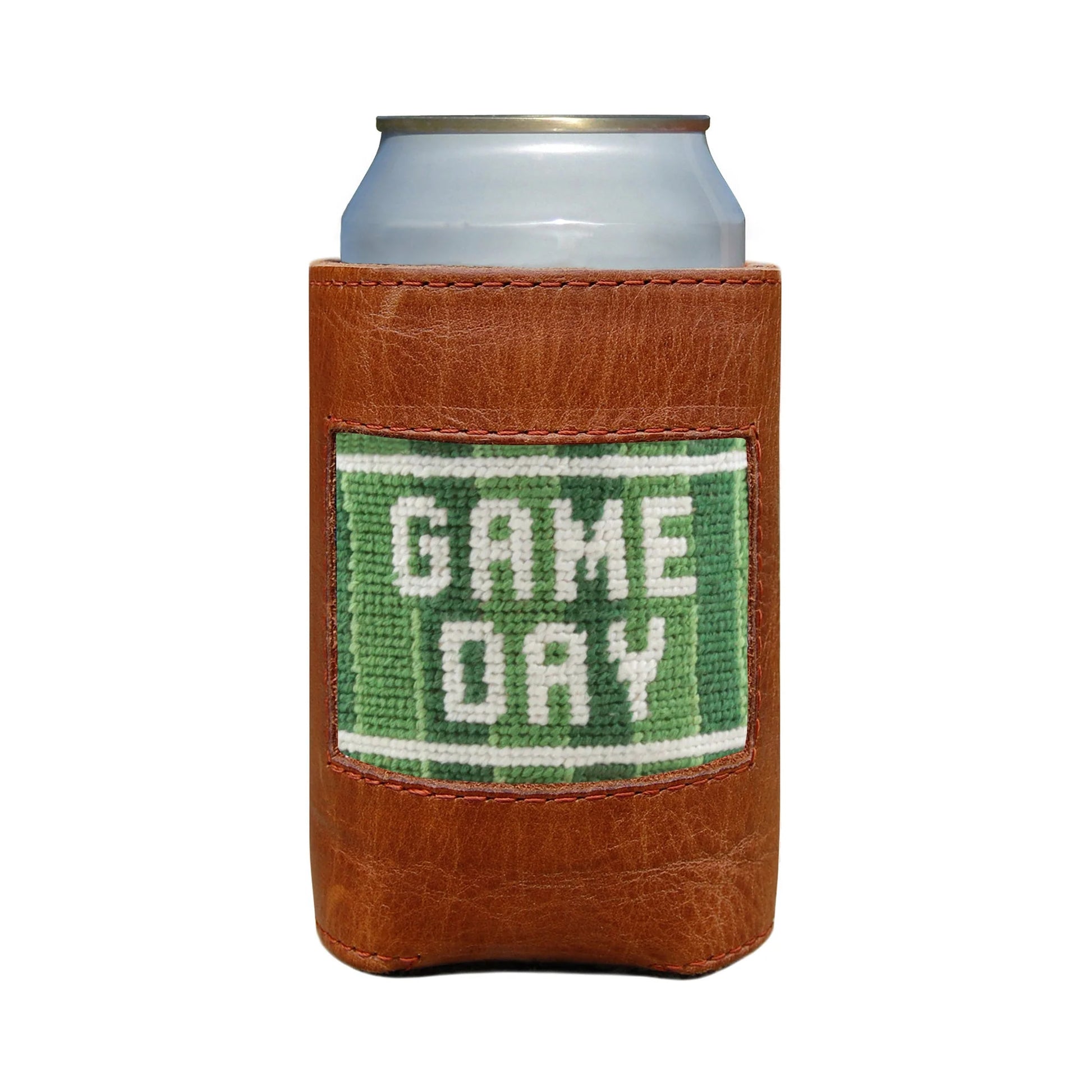 A can in a Smathers & Branson Game Day Can Cooler—a brown leather holder featuring a green patch with "GAME DAY" in white letters.