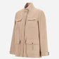 The Herno Loro Piana Wool Silk Linen Safari Jacket in beige features long sleeves, a stand collar, four front flap pockets, and buttoned cuffs, shown against a plain white background.