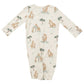 The Angel Dear Giraffe Families Convertible Gown showcases an enchanting giraffe and tree design set against a soft white background. Featuring long sleeves for added warmth, this baby sleeper is crafted from a snug blend of bamboo viscose and spandex, ensuring comfort with every wear. It is also easy to care for with machine wash instructions.