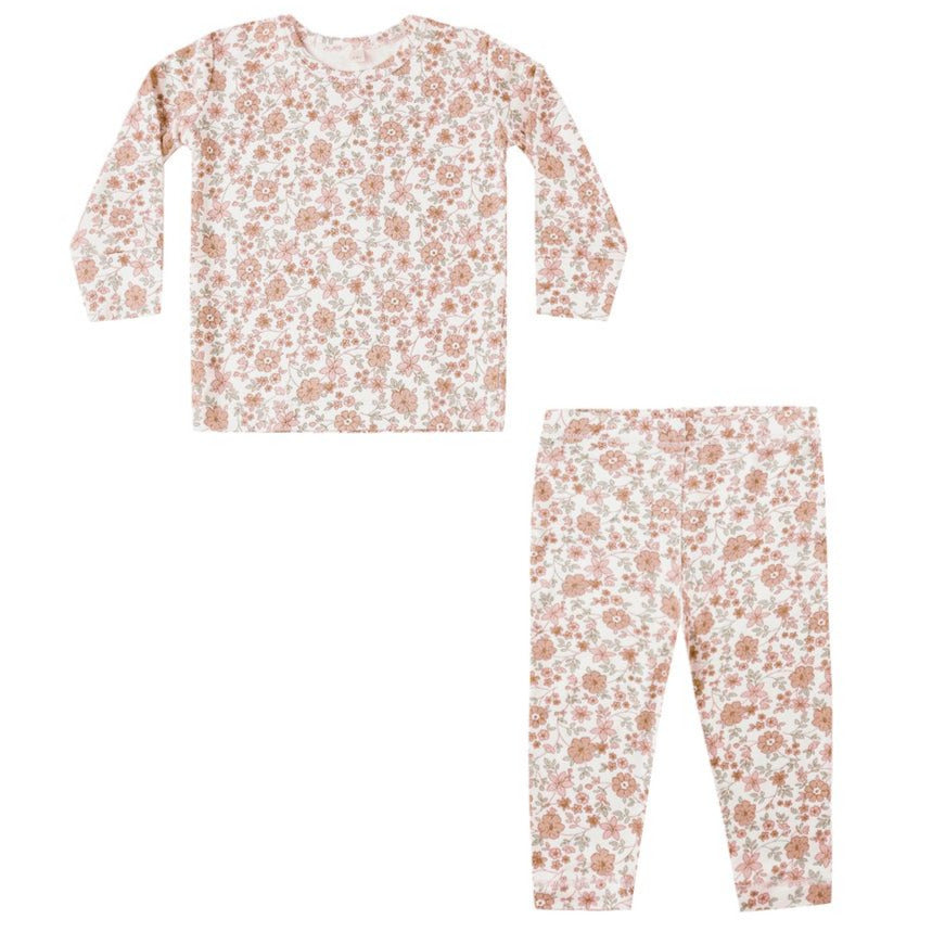 The Quincy Mae Baby Girls' and Girls' Bamboo Pajama Set features a two-piece slim-fit design with long sleeves and pants, showcasing a light pink and brown floral pattern on white.