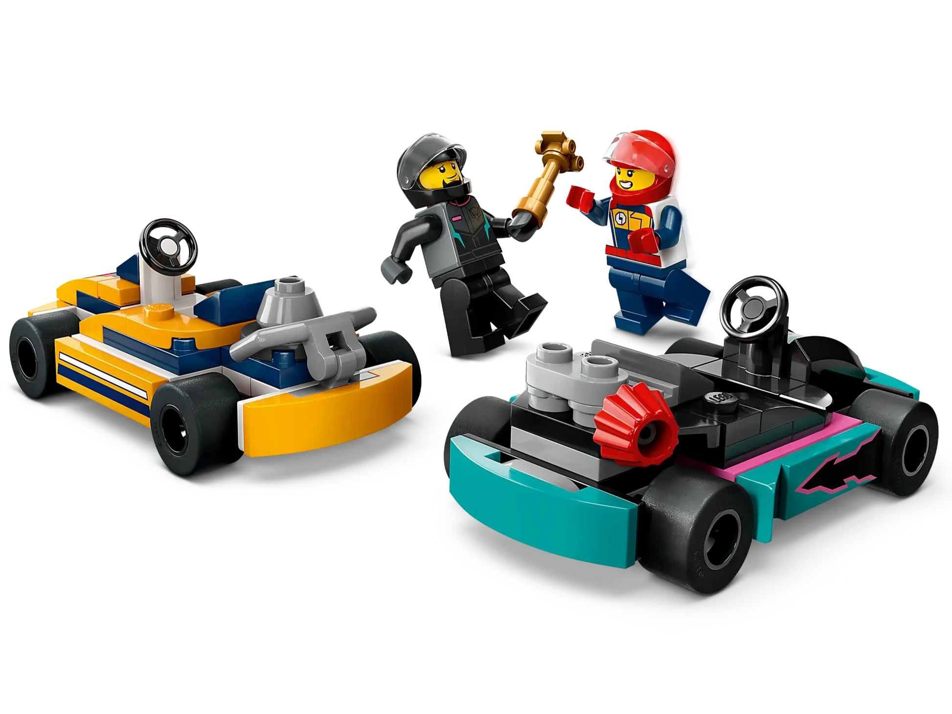 Two minifigures in racing outfits from the LEGO® Go-Karts & Race Drivers set by Legos - Toyhouse stand next to two colorful race cars, one vibrant yellow and the other a striking blue. One figure triumphantly raises the winner's trophy, celebrating an exciting victory in the thrilling world of LEGO racing.