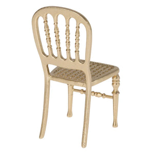 The Maileg Gold Chair, Mouse features a vintage spindle backrest, perforated seat, and four legs—a perfect addition to your Maileg mouse castle.