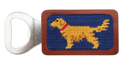 The Smathers & Branson Golden Retriever Bottle Opener is hand-stitched and features a yellow dog with a red collar on blue, plus a wooden handle.