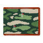 The Smathers & Branson Bi-Fold Wallet showcases a green and tan camouflage needlepoint design with stitched golf course flags, finished with luxurious brown Italian leather trim.