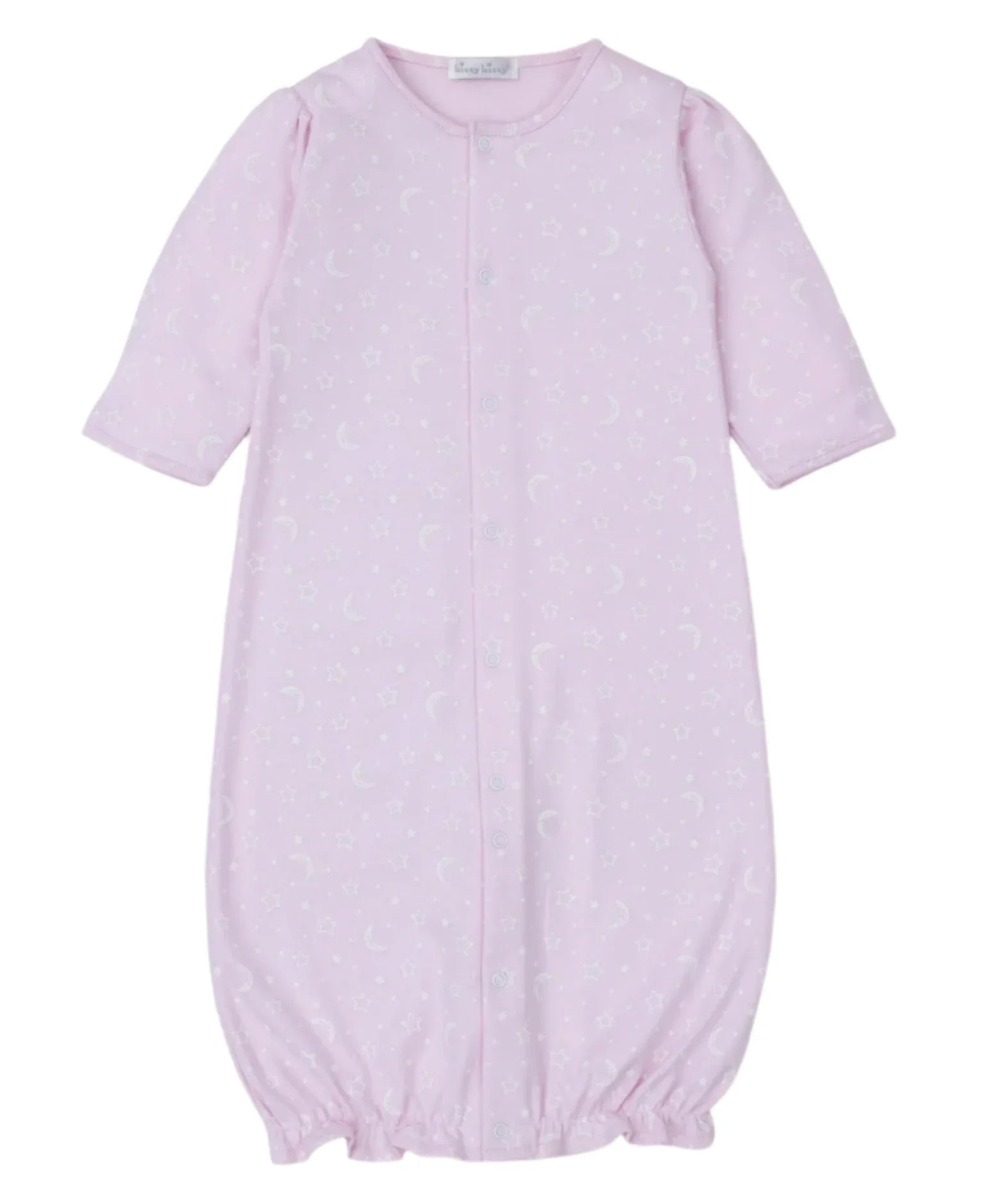 The Kissy Kissy Crescent Moonlight Printed Convertible Gown, designed by the renowned brand Kissy Kissy, is a pink baby sleep sack made from luxurious Pima cotton. It features long sleeves and is beautifully adorned with subtle crescent moon and star patterns. With snap closures down the front and elastic at the bottom, this garment easily converts into a gown, offering versatile clothing options for your baby.