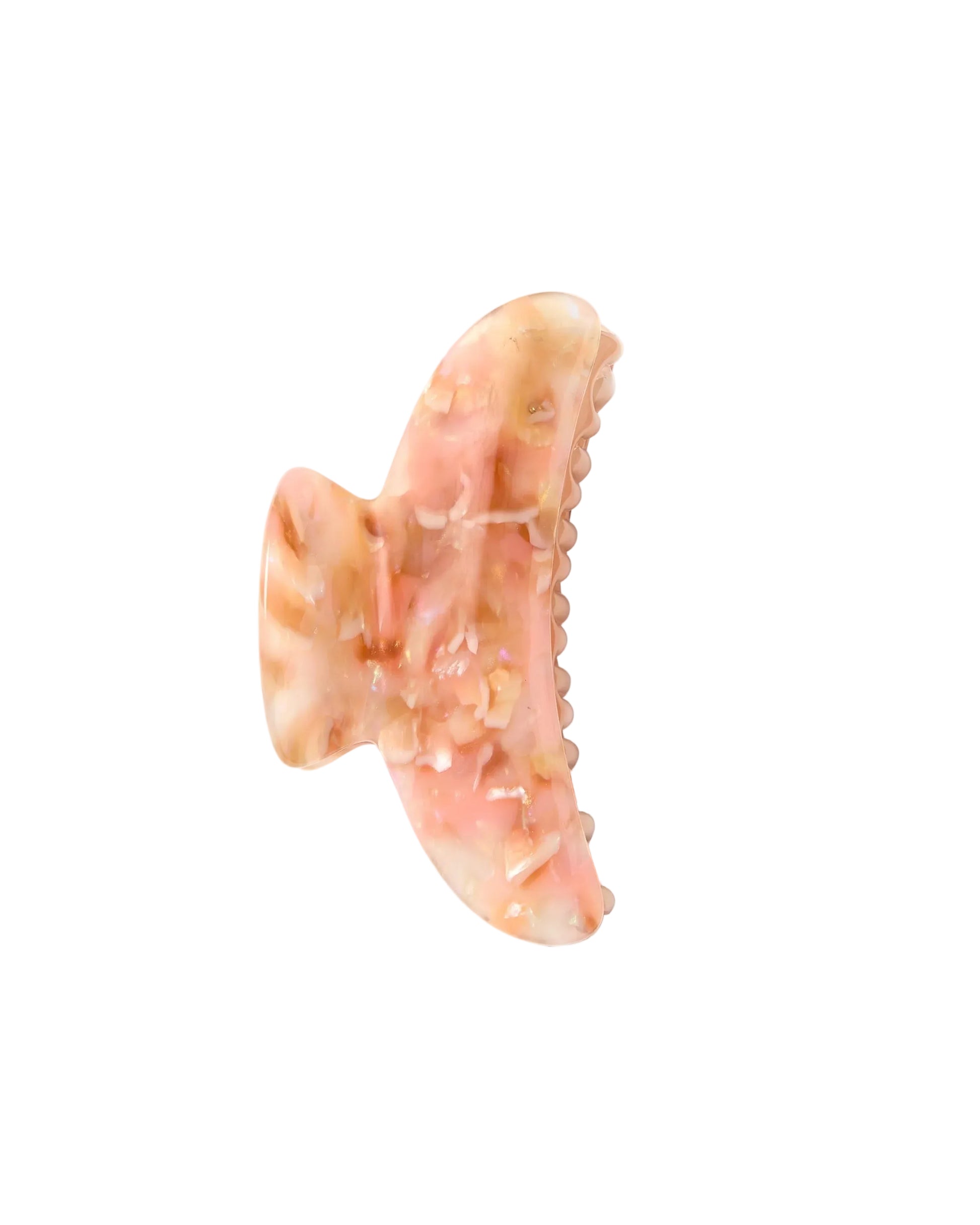 The Machete Grande Heirloom Claw is a pink and beige marbled hair claw clip, expertly crafted from premium Italian acetate with a curved shape and interlocking teeth—ideal for securing long, thick hair or styling large volume hair—shown against a white background.