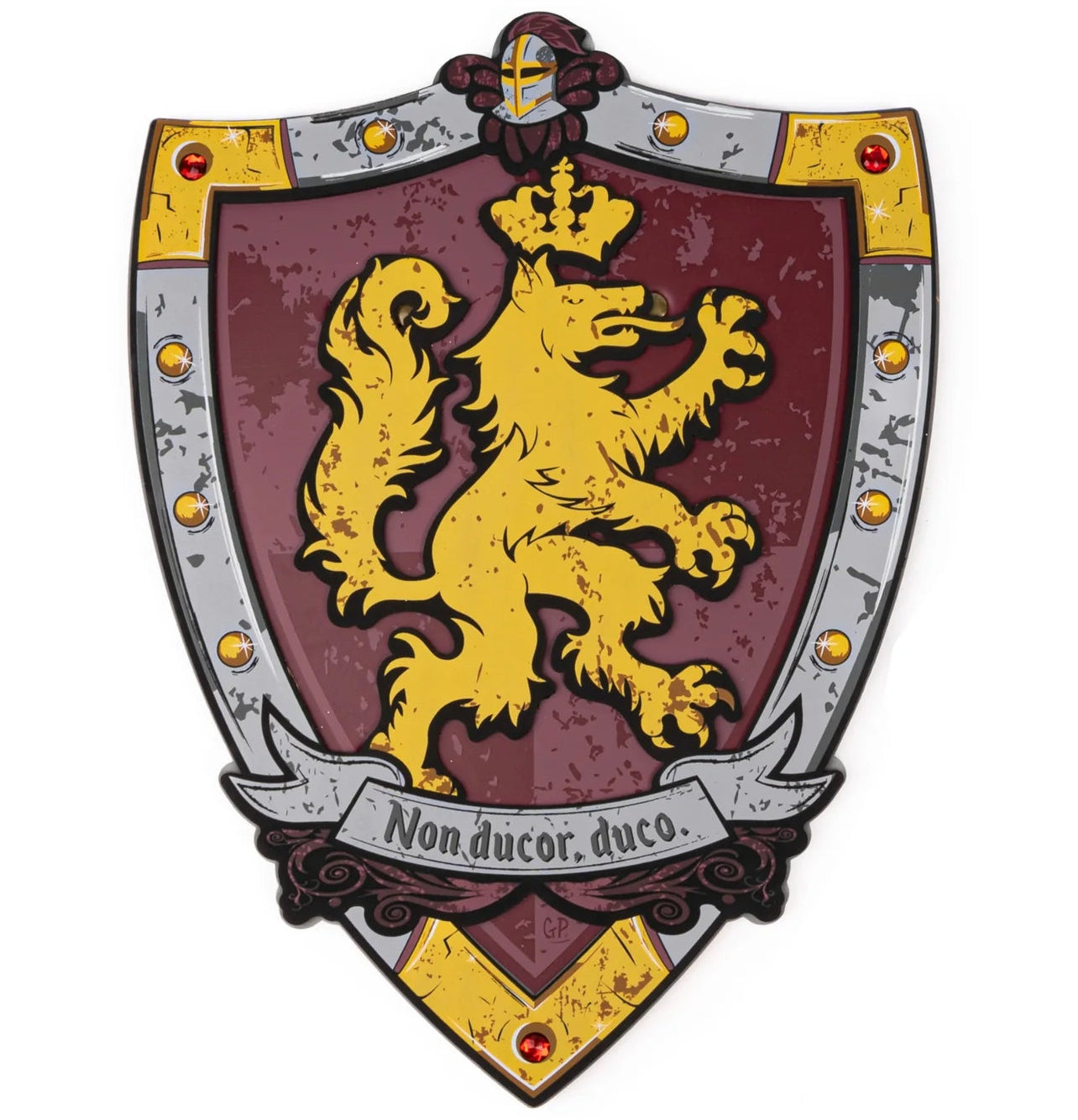 The Knights Honor Shield by Great Pretenders features a yellow lion on a red background, accented with a silver studded border and finished with a banner below displaying the Latin phrase “Non ducor, duco.” Designed especially for kids’ pretend play, this EVA foam shield includes adjustable Velcro straps for comfort and convenience.