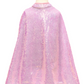 A pink, glittery Great Pretenders Sequins Cape displayed on a mannequin against a white background.