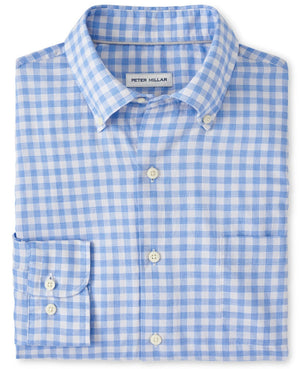 Peter Millar Elmwood Cotton Sport Shirt in a folded blue and white checkered pattern, crafted from cotton with a classic fit, and featuring a visible label on the button-down collar.