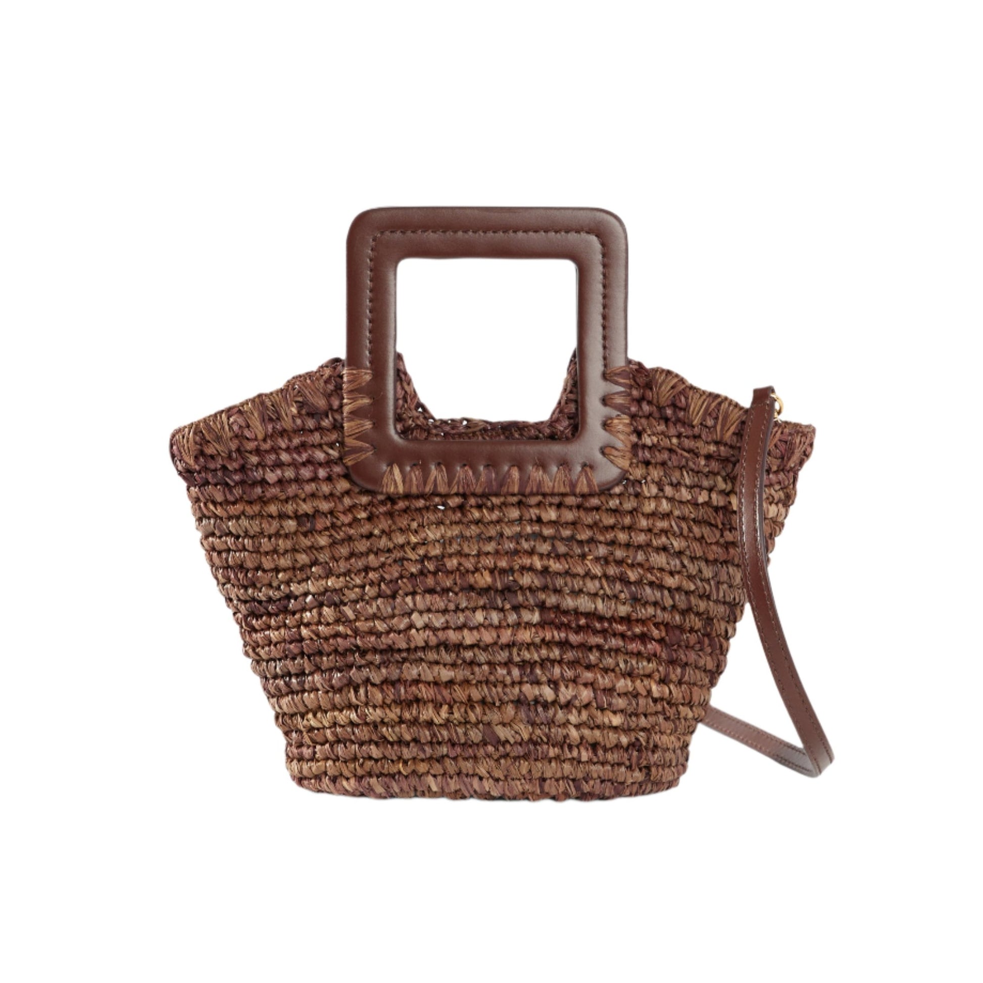 The Staud Shirley Mini Bucket raffia woven straw handbag features a square brown handle and a matching shoulder strap, echoing its chic design.