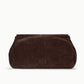 The Cy Oversized Bag by Staud, a large rectangular clutch crafted from brown suede as a bold statement accessory, is displayed against a plain white background.