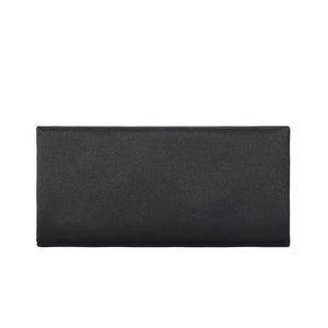 A rectangular, black envelope-style Staud Muse Clutch evening accessory is displayed against a plain white background, making it perfect for pairing with your favorite occasion dresses.