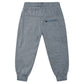 Back view of the Boys' Century Tech Jogger by Rylee & Cru, featuring a relaxed fit, elastic waistband, side pockets, and a zippered back pocket, laid flat on a white background.