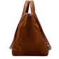 The Proenza Schouler Chelsea Large Soft Suede Tote in brown features leather accents and an adjustable shoulder strap, standing upright on a white background to highlight its elegant design and functionality.