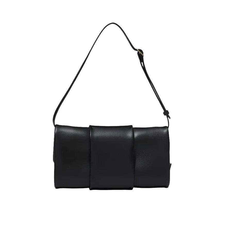 Black rectangular Proenza Schouler Flip Shoulder Bag in luxurious nappa leather with three padded sections, PS1 closure, and an adjustable strap.