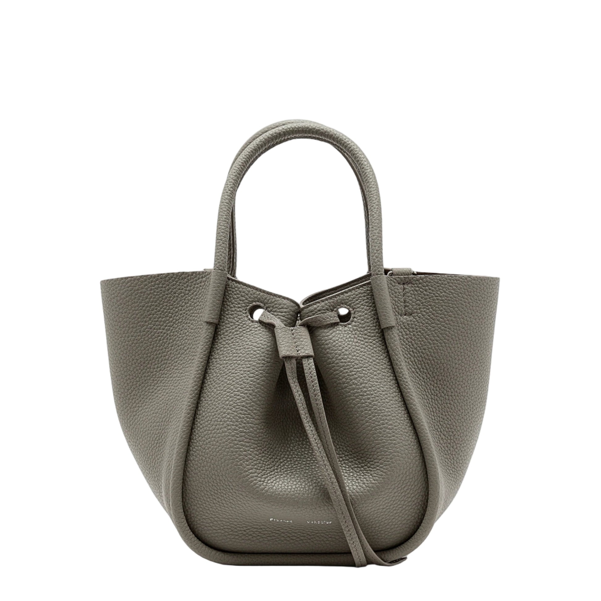 The Proenza Schouler Small Ruched Soft Pebbled Calf Tote in gray leather features a sculptural silhouette, drawstring closure, and double handles, displayed against a plain white background.