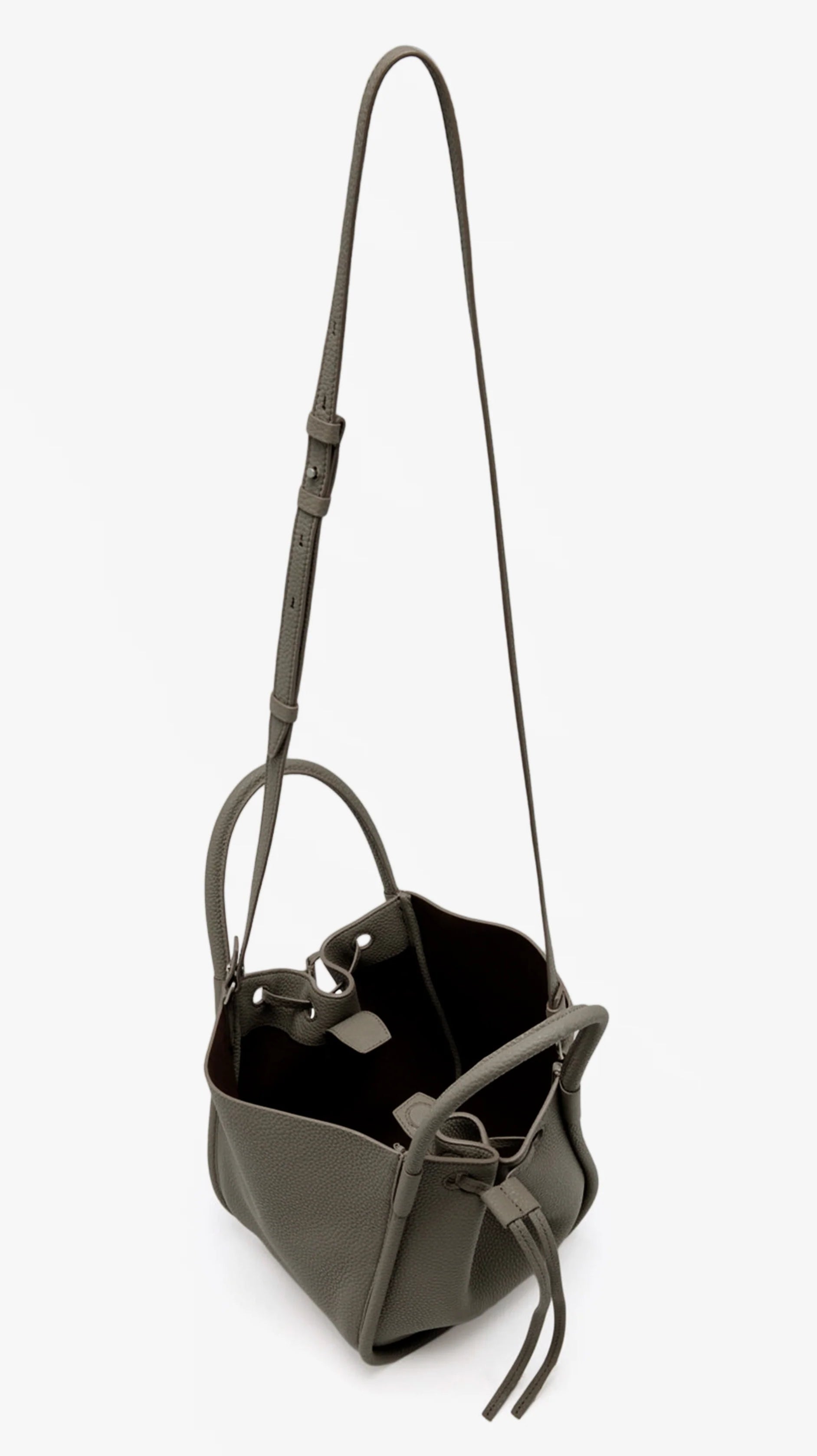 Proenza Schouler Small Ruched Soft Pebbled Calf Tote in gray leather with a sculptural silhouette, adjustable shoulder strap, and ruched drawstring open top, shown against a plain white background.