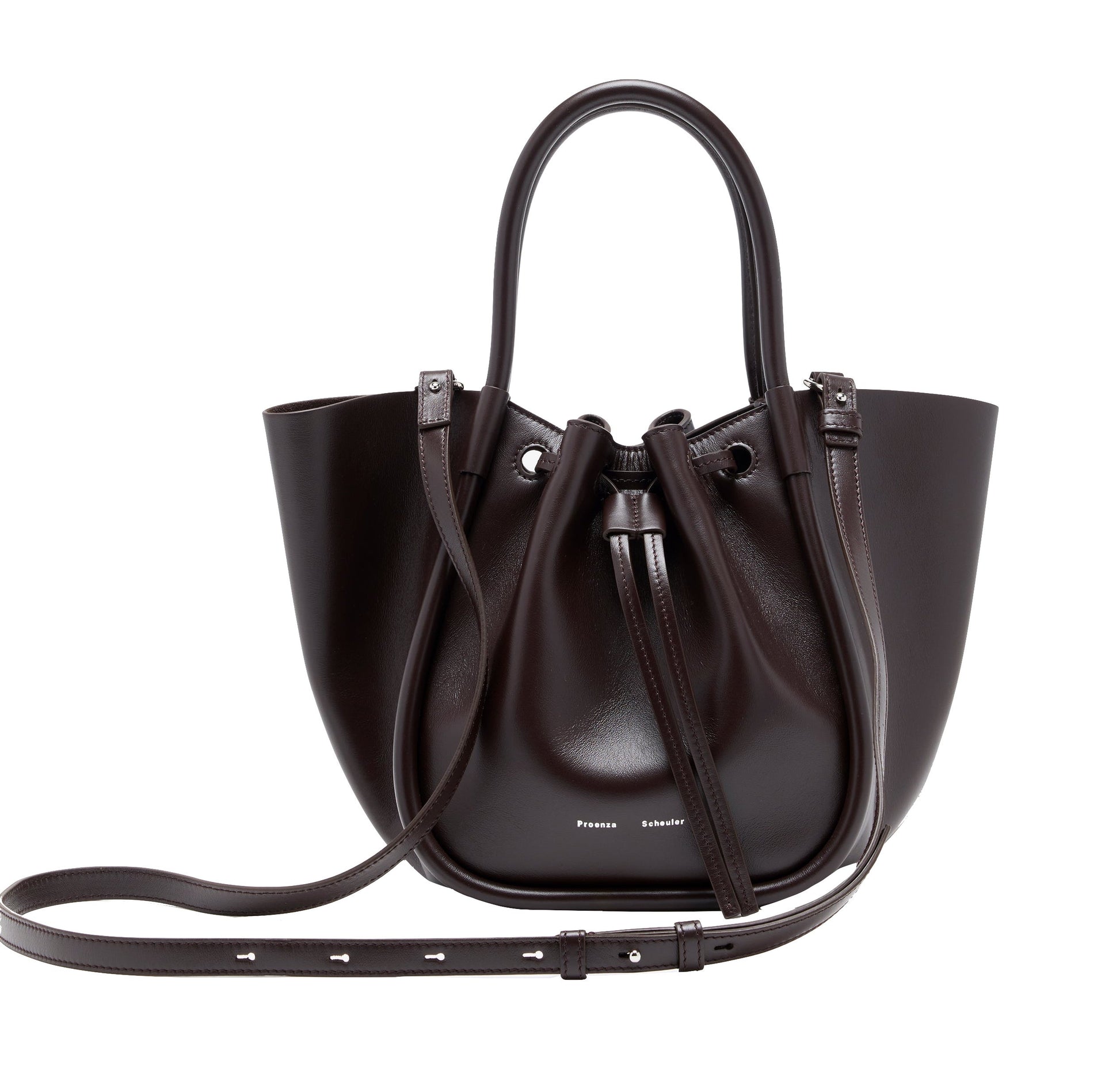 The Proenza Schouler Small Ruched Soft Shiny Tote in dark brown leather features a sculptural silhouette, a drawstring closure, double handles, and an adjustable shoulder strap, showcased against a white background.