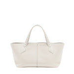The Proenza Schouler East West Chelsea Tote is a spacious, white leather bag with two handles and a structured shape, featuring minimalist pebbled calfskin design, photographed on a plain white background.