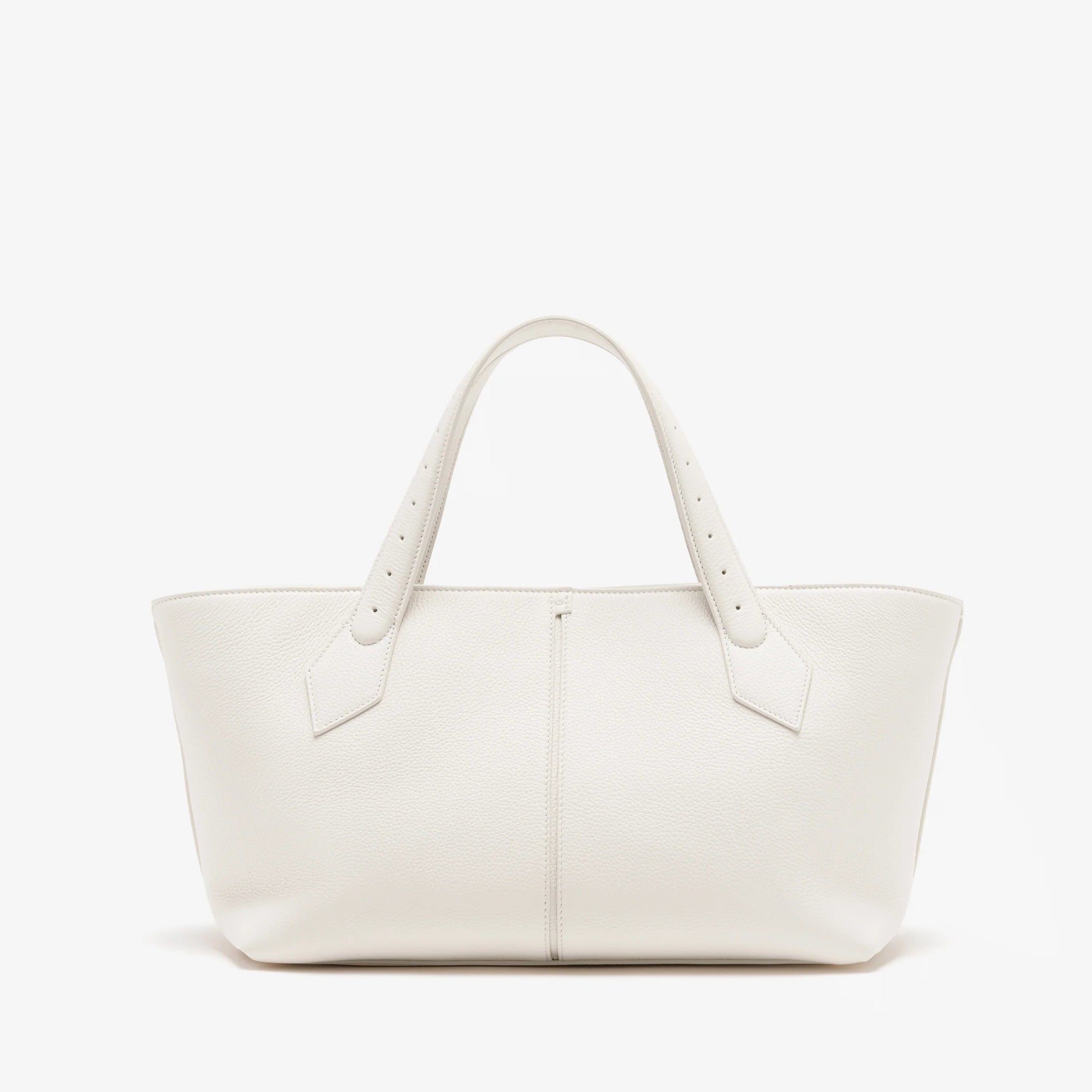 The East West Chelsea Tote by Proenza Schouler showcases a structured silhouette in white pebbled calf leather, two handles, and a minimal design, set against a plain white background.