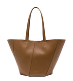 The Proenza Schouler Hex Tote is a large brown calf leather bag featuring two handles, subtle stitching, and a clean, minimalist design.