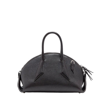 The Proenza Schouler Small Bowler Bag features black goatskin leather with a rounded top, two handles, and a textured finish. Silver hardware and a decorative tassel accent one handle, lending distinctive charm to this stylish accessory.