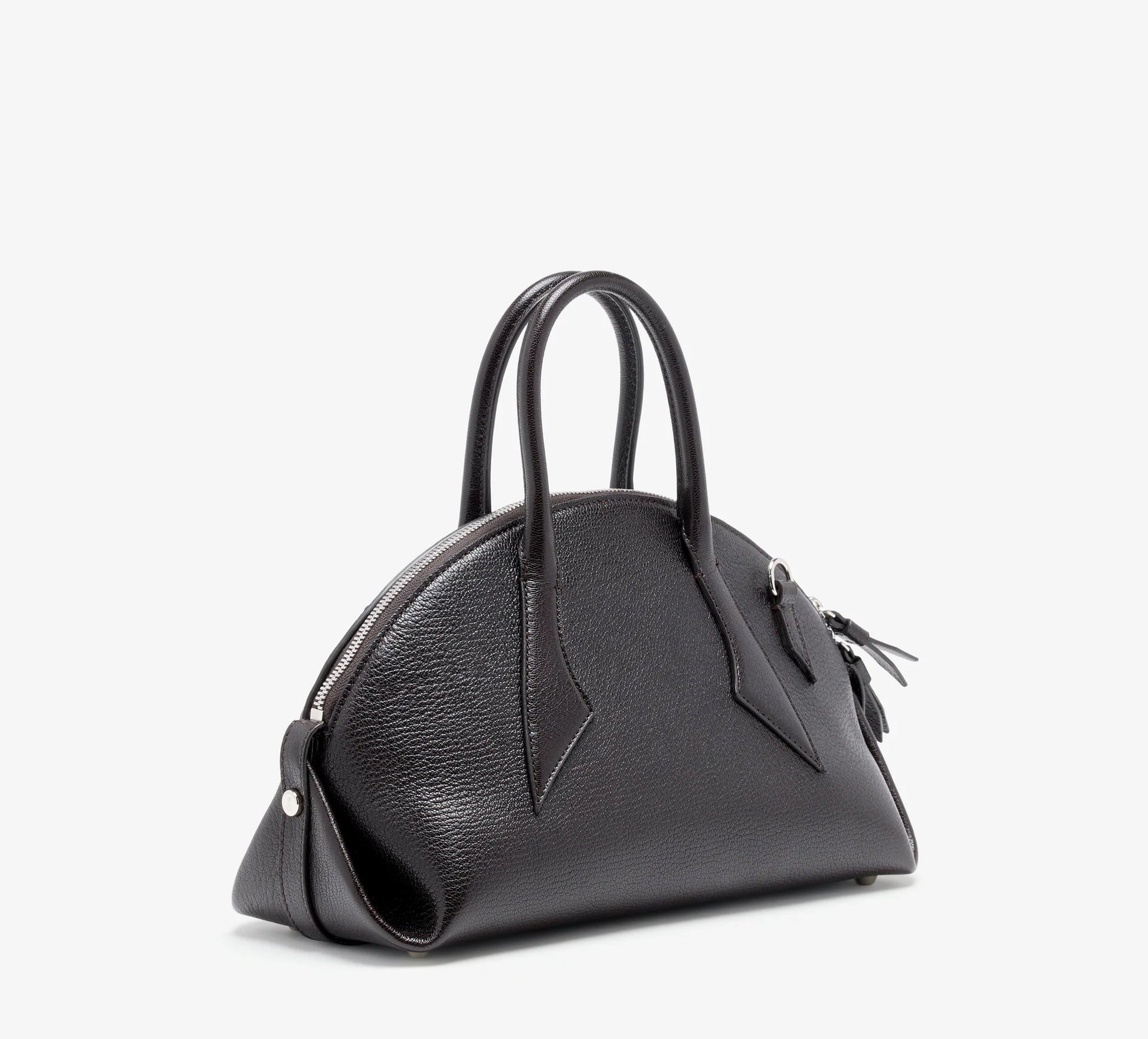 The Proenza Schouler Small Bowler Bag, crafted in black leather with two handles, a distinctive triangular shape, visible zipper closure, and silver-tone hardware, is displayed against a plain white background.
