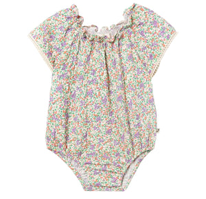 The Cozmo Baby Girls' Holly Floral Bubble features a ruffle neckline, short sleeves, and a multicolored floral print on soft white cotton voile.