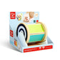 The Hape Spinning Drum w/ Mirror is a wooden sensory toy featuring a tummy time mirror, perfect for babies aged 3–18 months, and comes displayed in its branded Hape packaging.