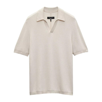 The Harvey Chevron Johnny Polo by Rag & Bone is a beige, short-sleeve knit shirt with a soft cotton blend, chevron textured pattern, and an open V-neck collar.
