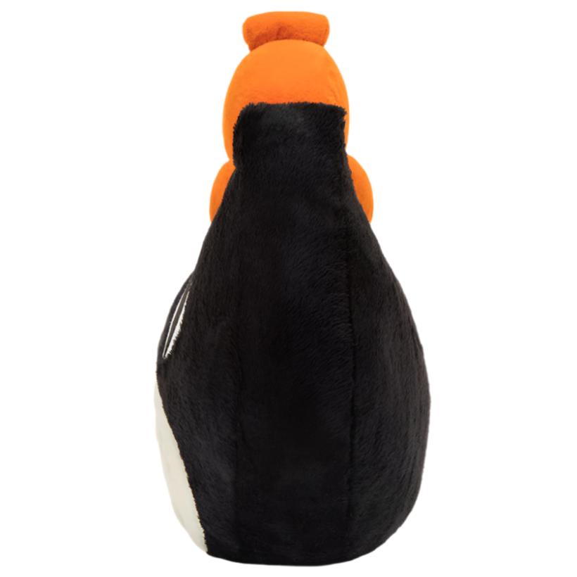 Back view of the Jellycat Jack Head, Giant featuring a plush penguin design with a black and white body and an orange beak, capturing the whimsy characteristic of Jellycat products.