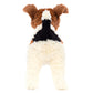 The back view of the Jellycat Hector Fox Terrier plush toy showcases its predominantly white fur, brown ears, and a black patch on its back, reminiscent of an adventurous companion.