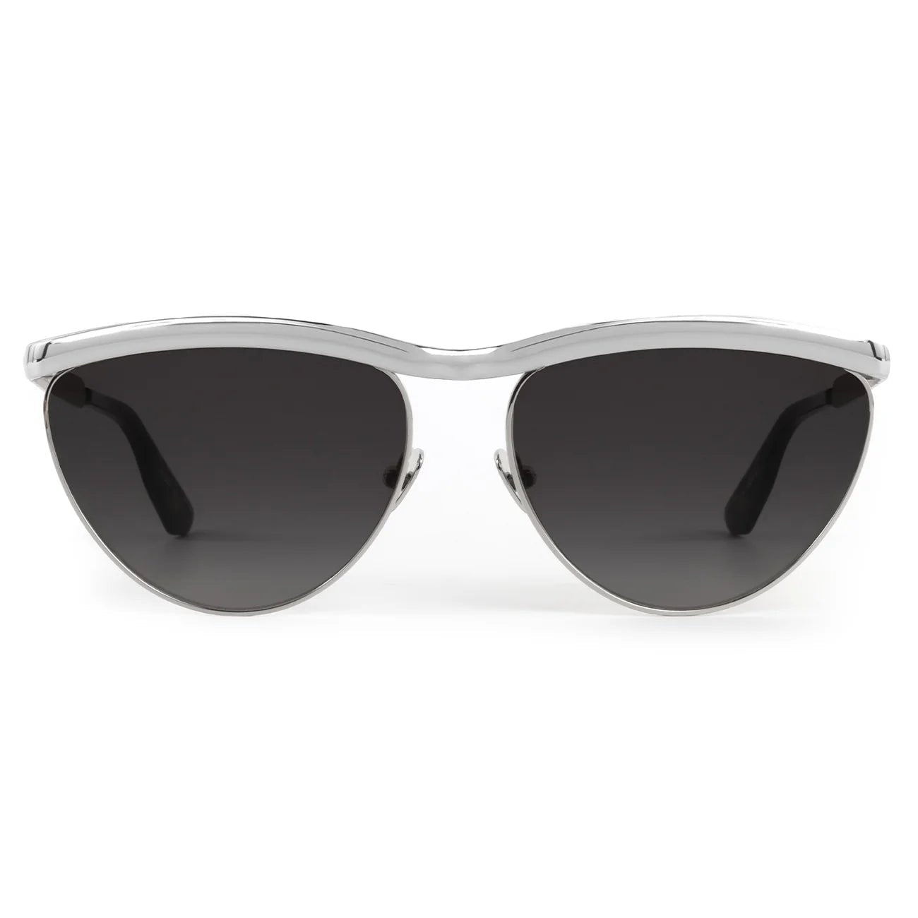 The Krewe Heidi Sunglasses feature vintage-inspired cat-eye silver frames, an architectural metal brow bar, and dark lenses, displayed from the front on a white background.