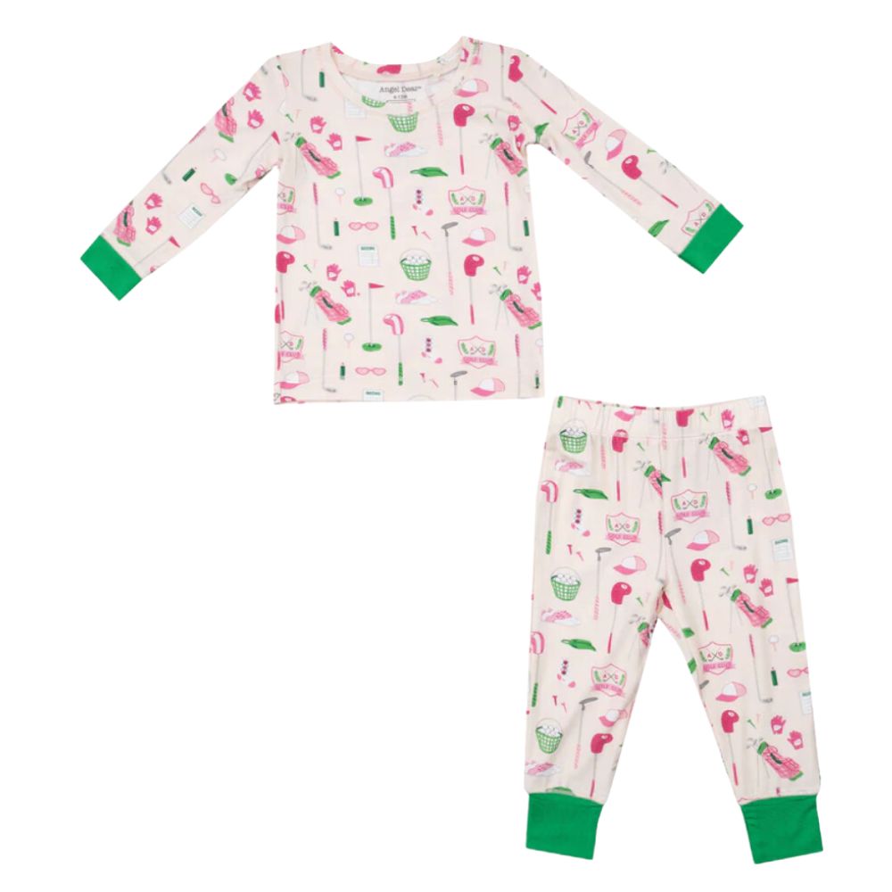 Introducing the Angel Dear Golf Club Pink LS Loungewear Set, a delightful pajama set from the renowned brand Angel Dear. This matching set for kids includes a white long-sleeve top and pants adorned with charming pink flamingos, glasses, and additional green and pink embellishments. The green cuffs add a stylish touch to this cozy ensemble. Crafted from soft viscose derived from bamboo, this loungewear ensures ultimate comfort throughout the night.