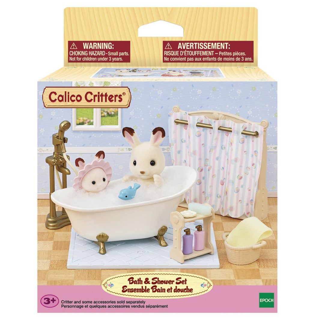 Box of Calico Critters Bath & Shower Set, featuring cute animal figures in a toy bathtub with bath time accessories and an antique-style bath fitting; includes a warning that the set contains small parts and is not suitable for children under 3 years.