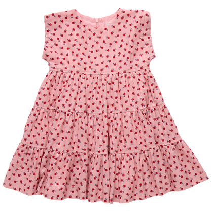The Girls' Peachy Dress by Pink Chicken is a pink, short-sleeved, tiered dress adorned with a charming pattern of small red flowers.