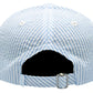 Back view of the Lil Bro Baseball Hat by Bits & Bows in blue and white seersucker, featuring an adjustable strap, metal buckle, and LIL BRO embroidery.