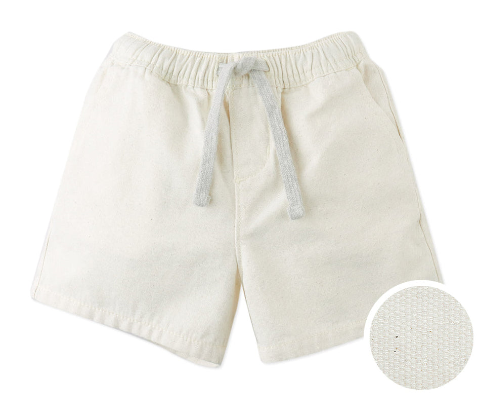 The Baby Boys' Huey Garterized Drawcords Shorts by Gingersnaps feature a cream hue, elastic waistband, gray drawstring, and soft offwhite canvas. Bottom right close-up displays the detailed fabric texture.