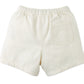 Back view of Gingersnaps Baby Boys' Huey Garterized Drawcords Shorts in offwhite canvas, featuring an elastic waistband and a right-side back pocket.