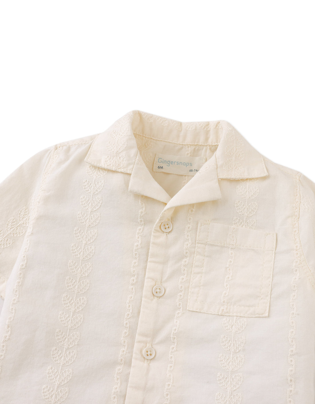 The Gingersnaps Baby Boys' Armin Embroidered Camp Collar Shirt features short sleeves, a chest pocket, textured vertical patterns, subtle leaf embroidery, and button front. Shown flat on a white background.