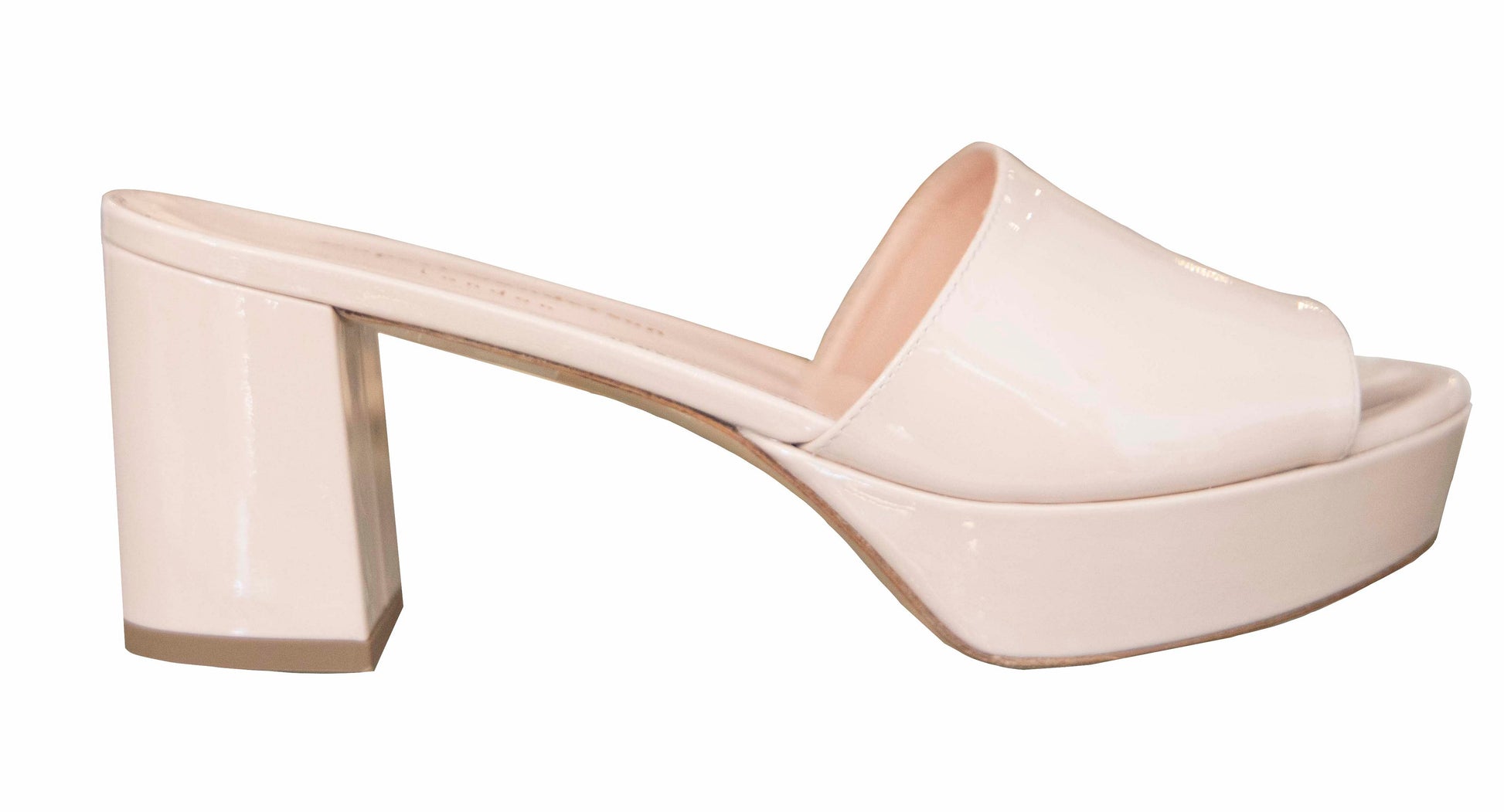 A cream-colored mid-platform high heel shoe with an open toe design, handmade in Italy by Rupert Sanderson, isolated on a white background.