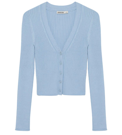 The Ailany Cardigan by Simkhai is a light blue ribbed knit piece with long sleeves, a V-neckline, and button front closure, shown on a plain white background.