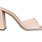 A women's nude leather Staud Sloane Heel mule with a chunky heel.