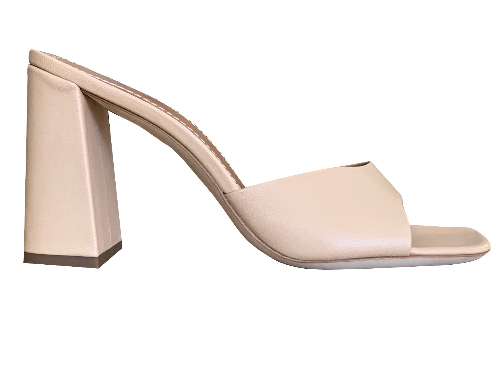 A women's nude leather Staud Sloane Heel mule with a chunky heel.