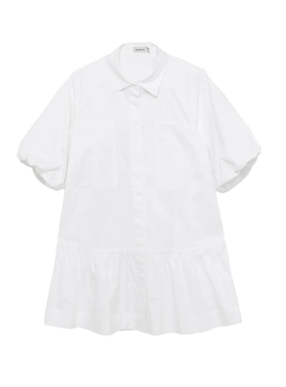 The Simkhai Crissy Dress is a short-sleeved white mini dress with a collar, button-down front, and gathered hem—laid flat on a white background for an effortlessly casual look.