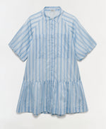 The Crissy Stripe Dress by Simkhai is a light blue and white mini shirtdress with a collar, front buttons, and a gathered flared skirt, crafted from yarn-dyed satin for a soft sheen.