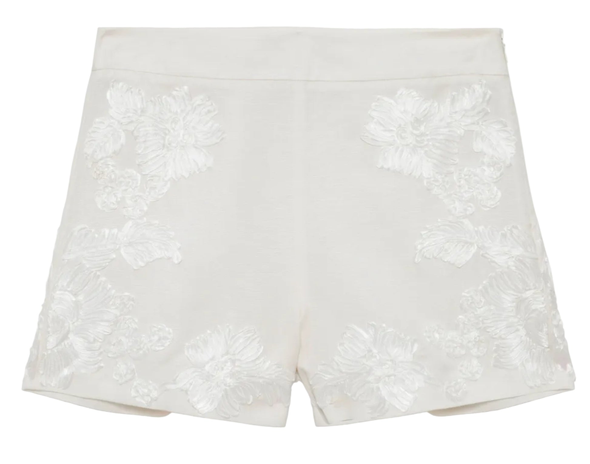 The Sammie Short by Simkhai features a high-waisted fit, floral embroidery on the front, and is crafted from breathable linen for enhanced comfort.
