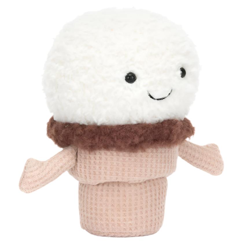 The Jellycat Amuseables Ice Cream Cone plush toy by Jellycat features a white, textured cream fur scoop on top with black eyes and a stitched smile, adorned with a brown collar. Its base resembles a light brown waffle cone and includes two arms for added charm.