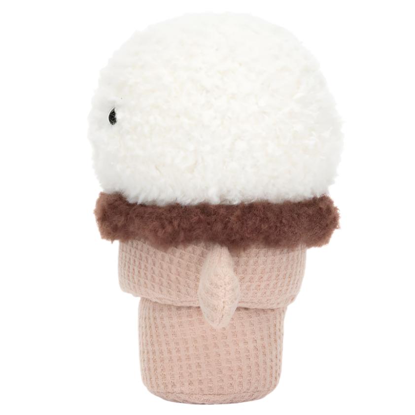 A plush toy from the Jellycat Amuseables Ice Cream Cone collection, featuring a round white head, brown fringe, and a beige body resembling a stylized ice cream cone with textured cream fur.